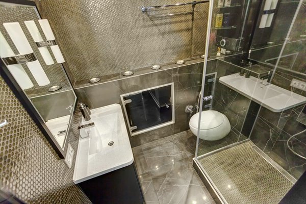 Как выбрать правильный ревизионный люк для ванной комнаты: советы и рекомендации
